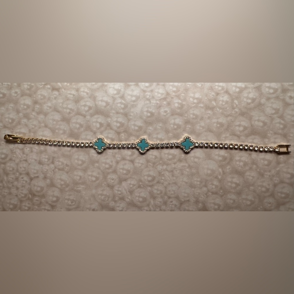 Elegant Gold and Teal Bracelet